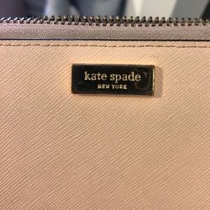 Pale pink, Kate Spade wallet.
